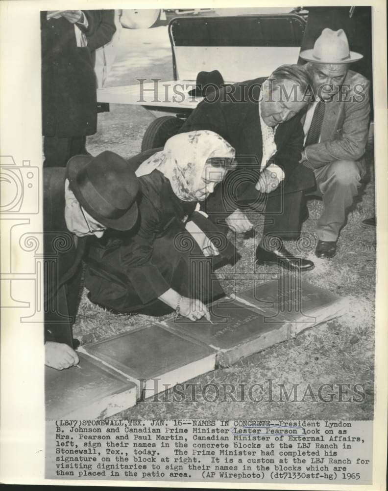 1965 Press Photo Johnson and Pearson watch Canadian dignitaries autograph blocks