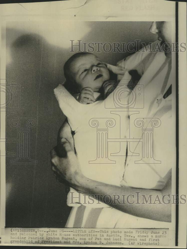 Load image into Gallery viewer, 1967 Press Photo President and Mrs. Johnson's first grandchild Patrick Nugent
