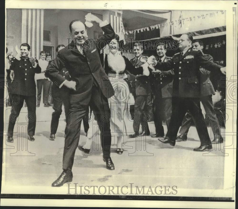Load image into Gallery viewer, 1971 Press Photo Greece's George Papadopoulos dances at Easter celebration

