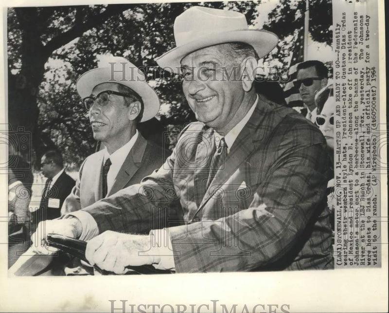 Load image into Gallery viewer, 1964 Press Photo Presidents Johnson and Ordaz ride in motor cart to LBJ barbecue
