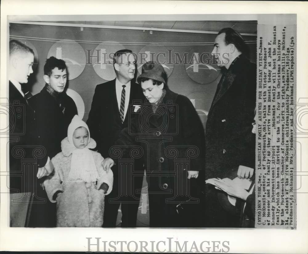 1963 Press Photo James McKenzie greets Victor Pozdneev family from Russia.