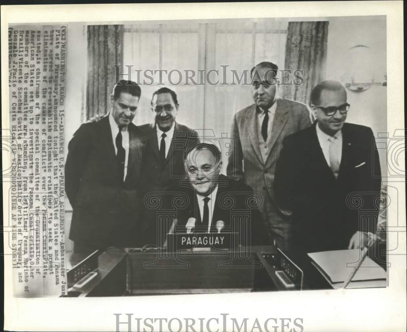 Load image into Gallery viewer, 1964 Press Photo Paraguay Ambassador Juan Plate announces U.S.-Panama agreement
