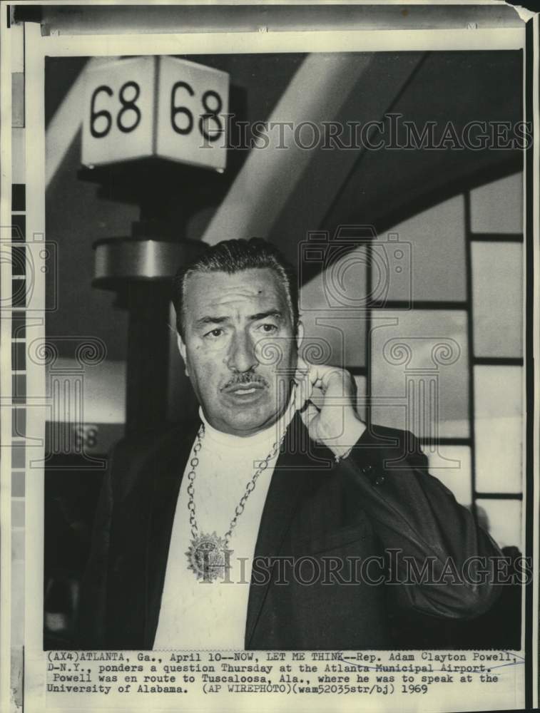 Load image into Gallery viewer, 1969 Press Photo Representative Clayton Powell ponders question in Atlanta
