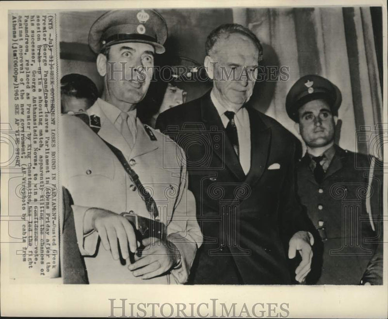 Load image into Gallery viewer, 1965 Press Photo Ousted Greek Premier George Papandreou leaves Parliament

