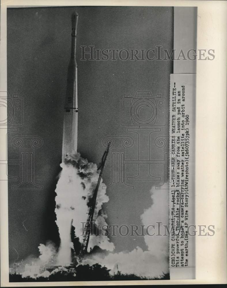 1960 Press Photo Thor-Able rocket leaves launch pad with weather satellite