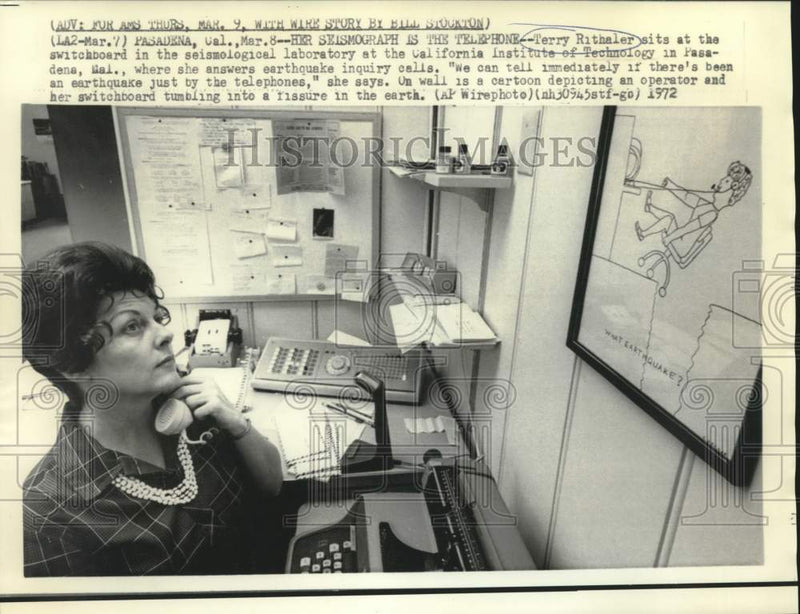 Load image into Gallery viewer, 1972 Press Photo Terry Rithaler answers earthquake inquiry calls at CIT
