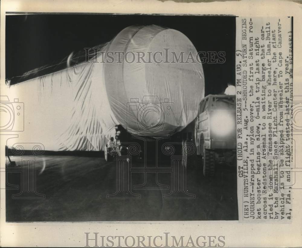 1961 Press Photo Shrouded Saturn begins journey across Redstone Arsenal to barge