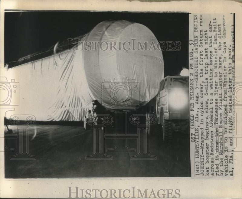 Load image into Gallery viewer, 1961 Press Photo Shrouded Saturn begins journey across Redstone Arsenal to barge
