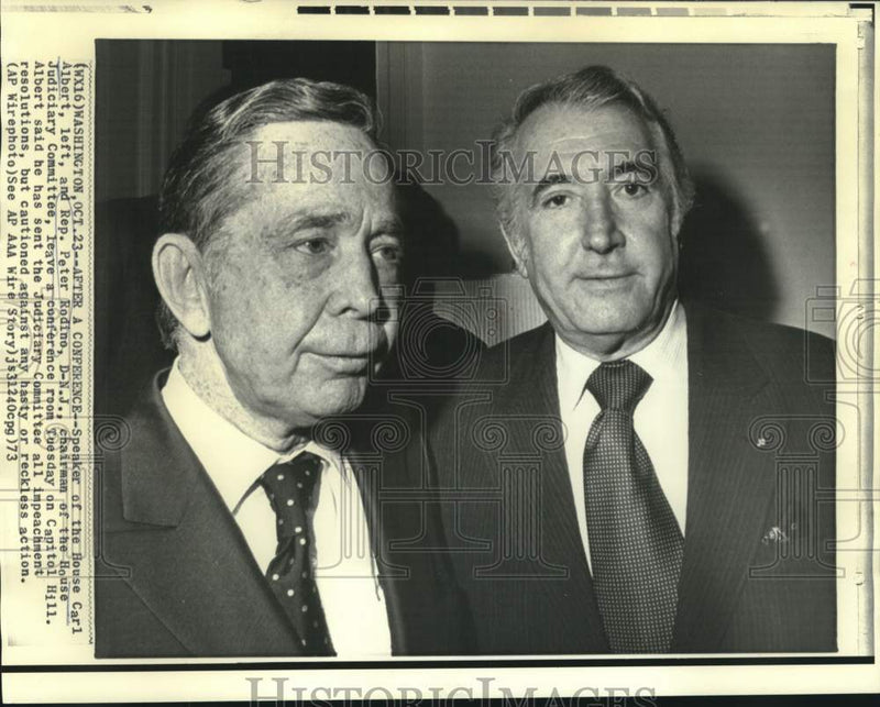 Load image into Gallery viewer, 1973 Press Photo Carl Albert and Peter Rodino leave Washington conference room
