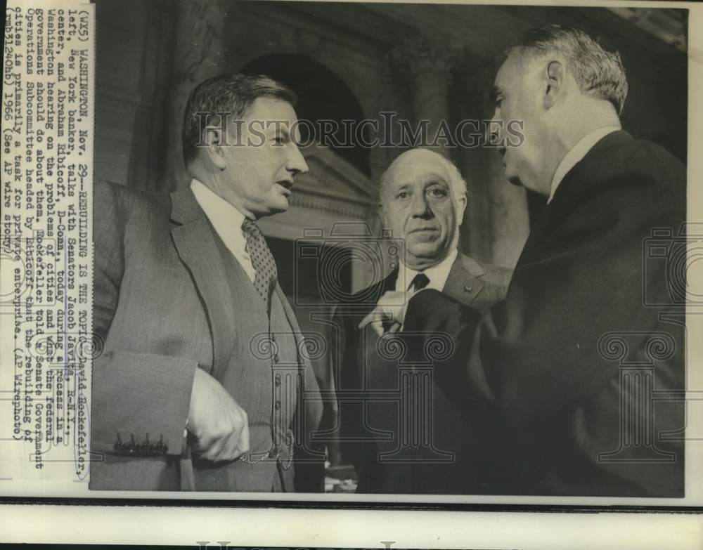 1966 Press Photo David Rockefeller and Senators talk of problems of cities
