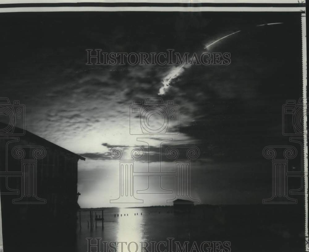 Press Photo Titan 3 streaks orbit-ward above boathouses near Cape Kennedy
