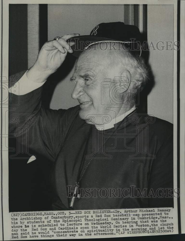 Load image into Gallery viewer, 1967 Press Photo Archbishop of Canterbury Michael Ramsey sports Red Sox cap
