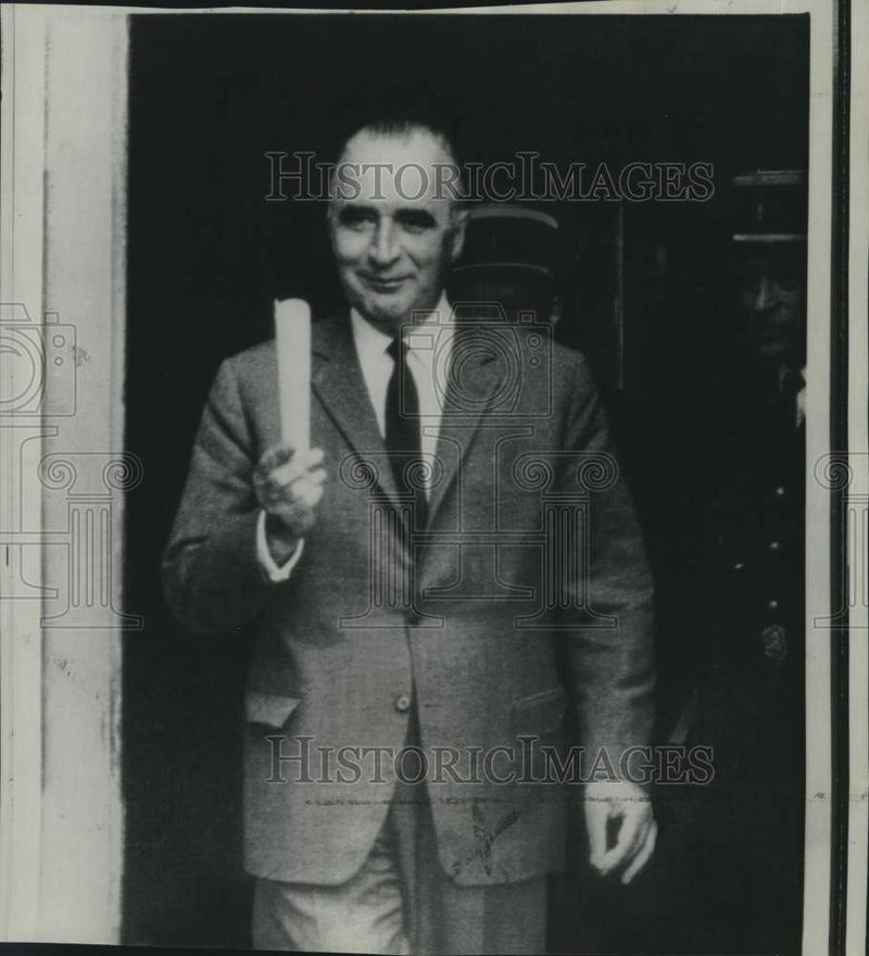 Load image into Gallery viewer, 1968 Press Photo French Premier Georges Pompidou leaves Hotel Matignon in Paris
