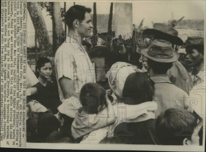 Load image into Gallery viewer, 1966 Press Photo U.S. Aid Mission's Douglas Ramsey before Viet Cong kidnapping
