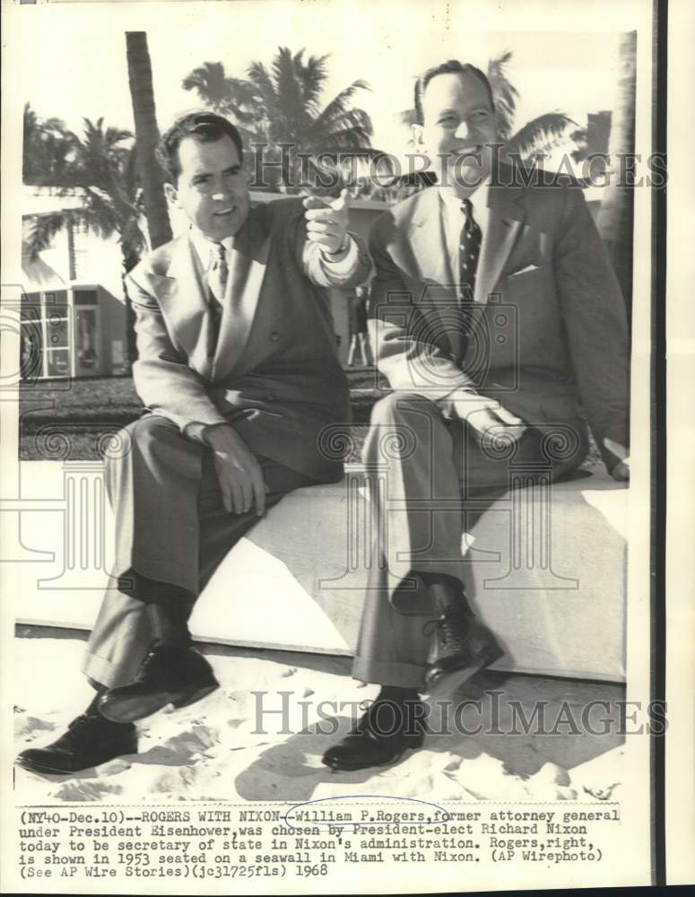 1953 Press Photo William Rogers and Richard Nixon sit on seawall in Miami, FL