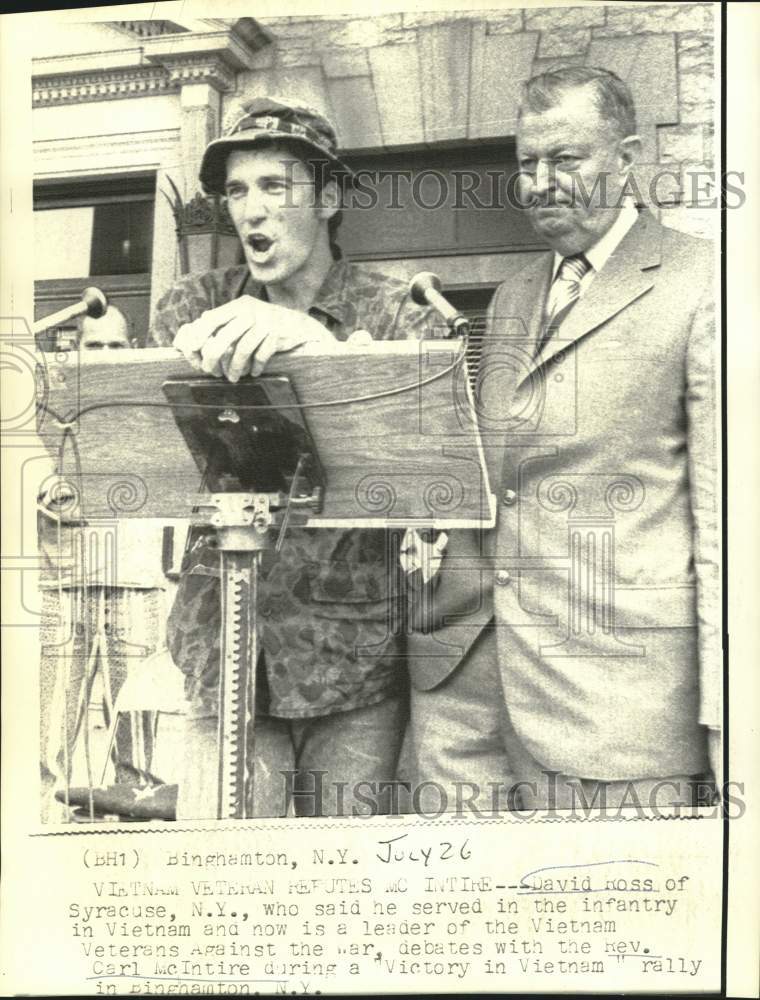 Load image into Gallery viewer, 1971 Press Photo David Ross, Carl McIntire debate at NY Victory in Vietnam rally
