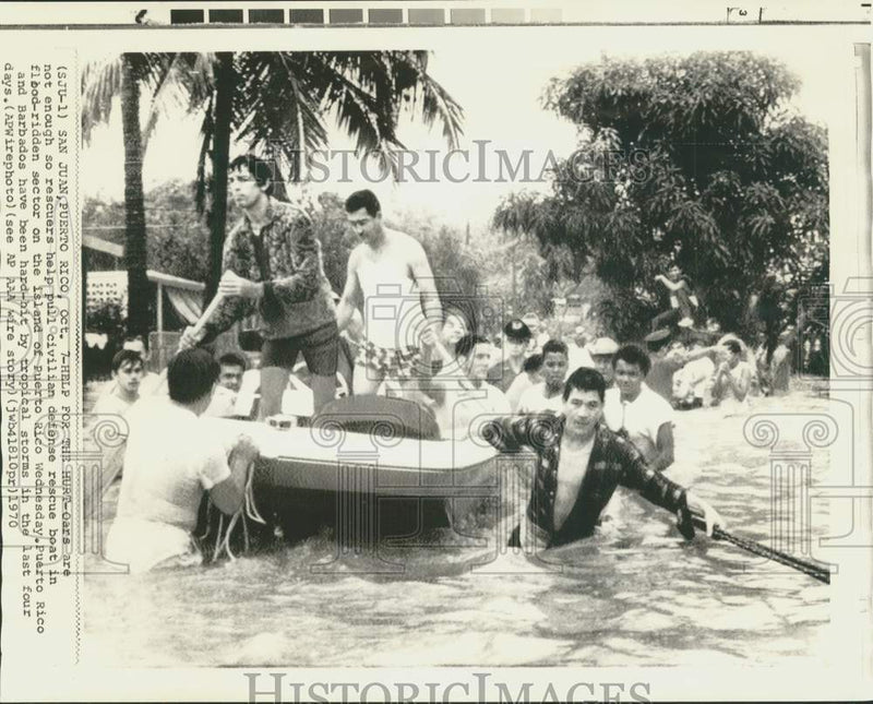 Load image into Gallery viewer, 1970 Press Photo Rescuers Pull Boat in Flooded Area of Puerto Rico - now39459

