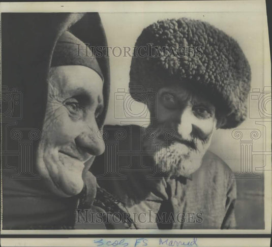 Press Photo Long married couple Balakishi, Amina Orujeva smile for photo, Russia