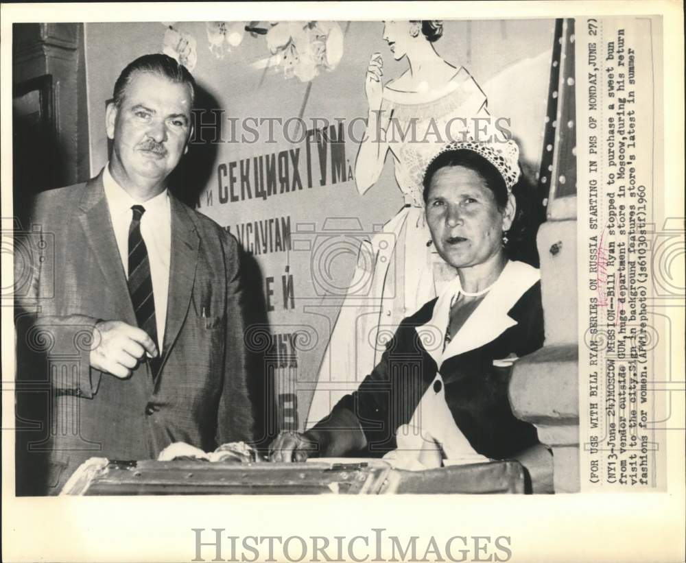 1960 Press Photo Journalist Bill Ryan Buys Sweet Bun from Vendor in Moscow