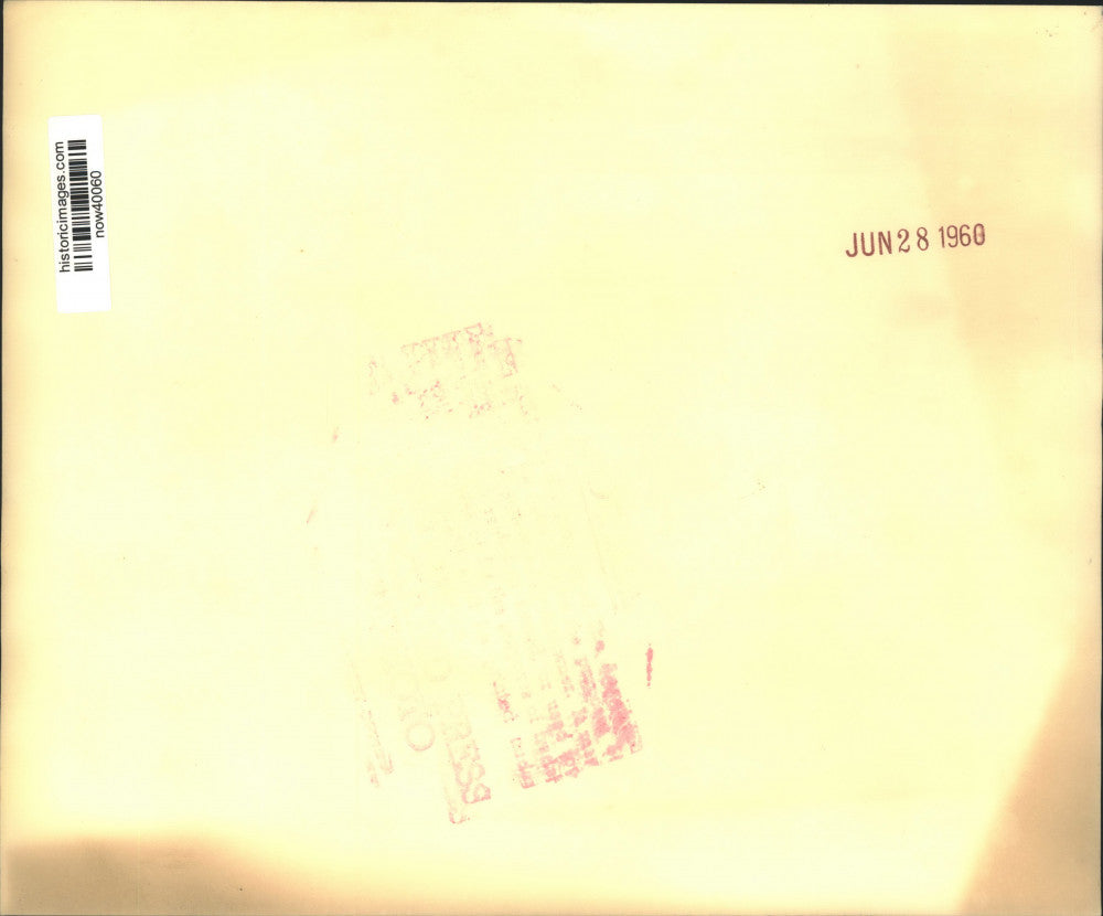 1960 Press Photo Journalist Bill Ryan Buys Sweet Bun from Vendor in Moscow