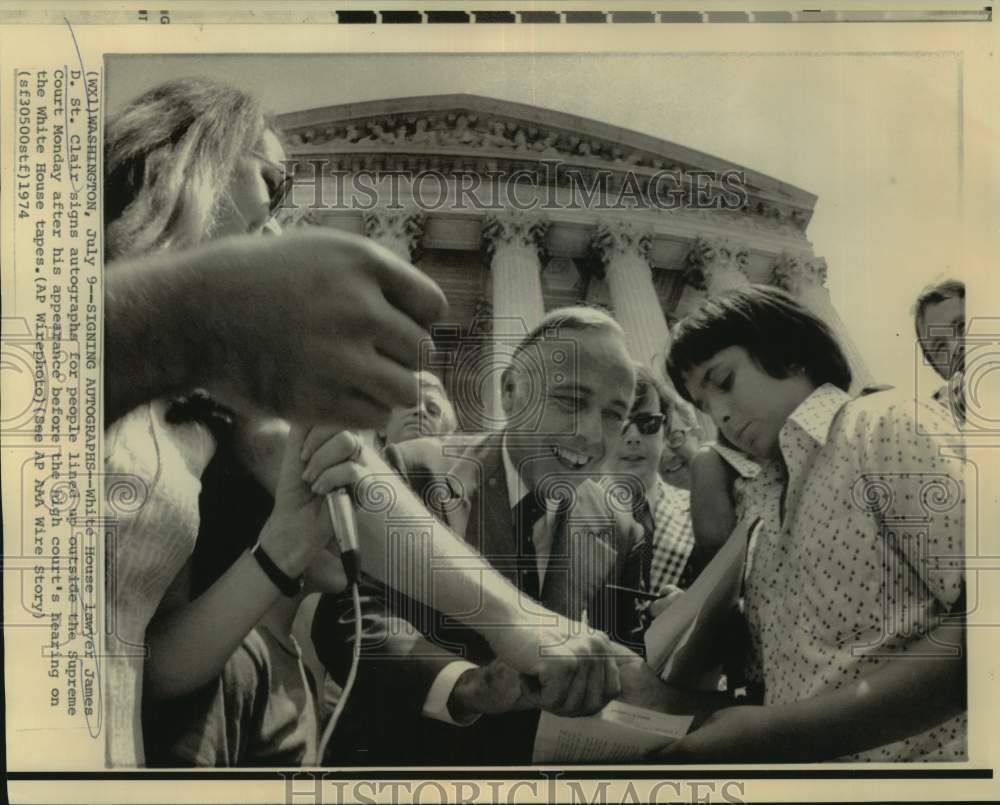 1974 Press Photo Presidential lawyer James St. Clair signs autographs, Wash.