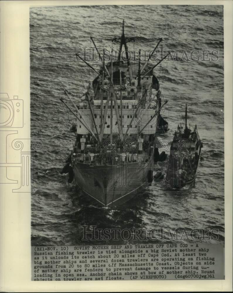 1961 Press Photo Russian Fishing Trawler Unloads Catch onto Mother Ship- Historic Images