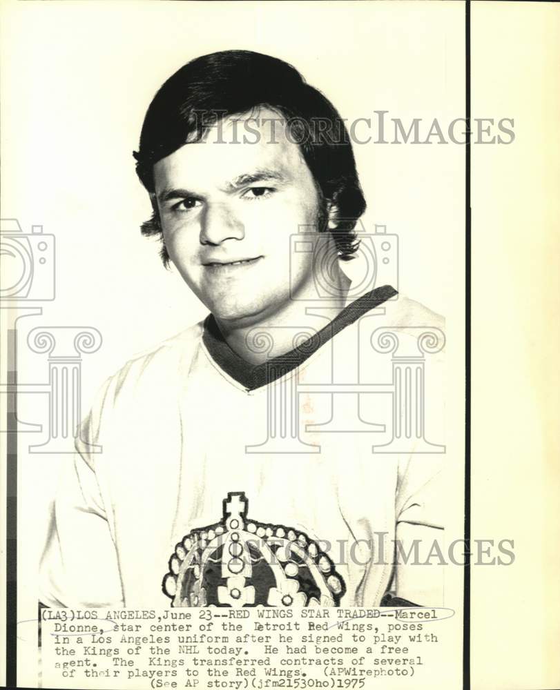 1975 Press Photo Ice hockey player Marcel Dionne poses in a Los Angeles uniform- Historic Images