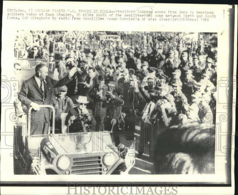 Load image into Gallery viewer, 1966 Press Photo President Johnson waves to American soldiers in Korea.
