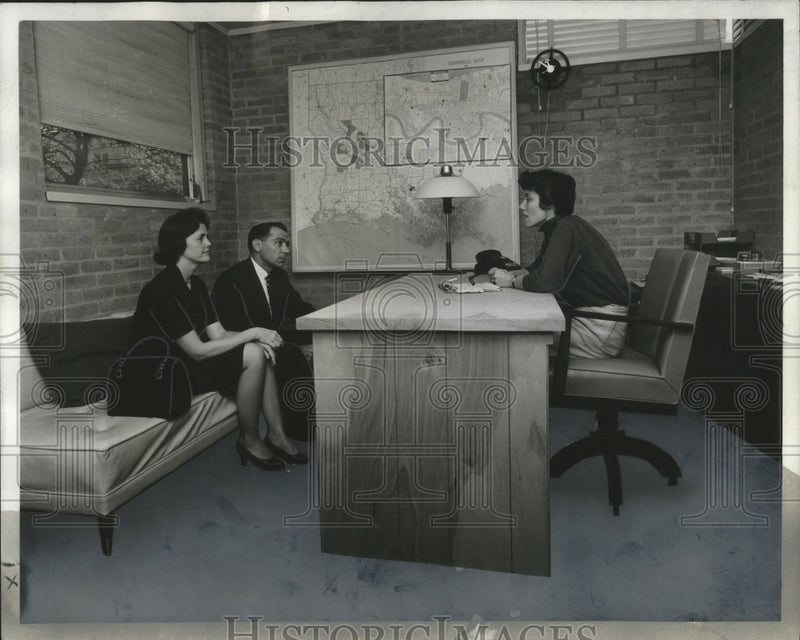 Load image into Gallery viewer, 1966 Press Photo Adoptions-Miss Sally Matlock meets in her office with a couple
