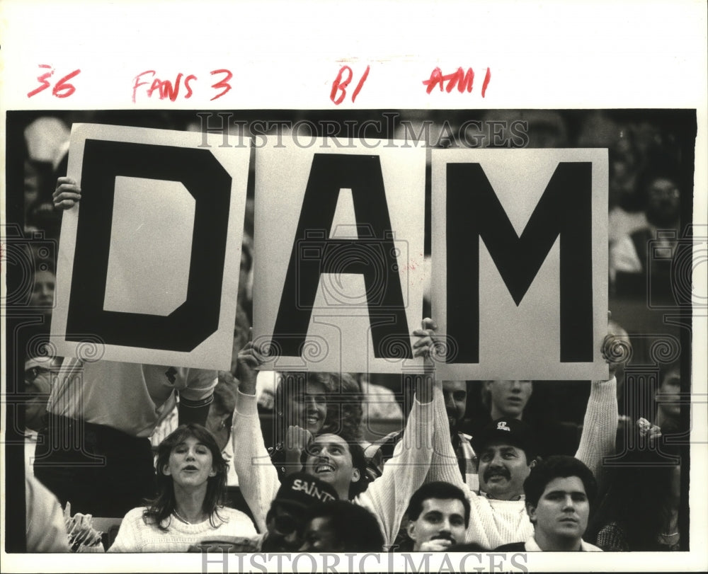 1988 Press Photo Fans hoist a 3 part placard for expressing their opinion- Historic Images