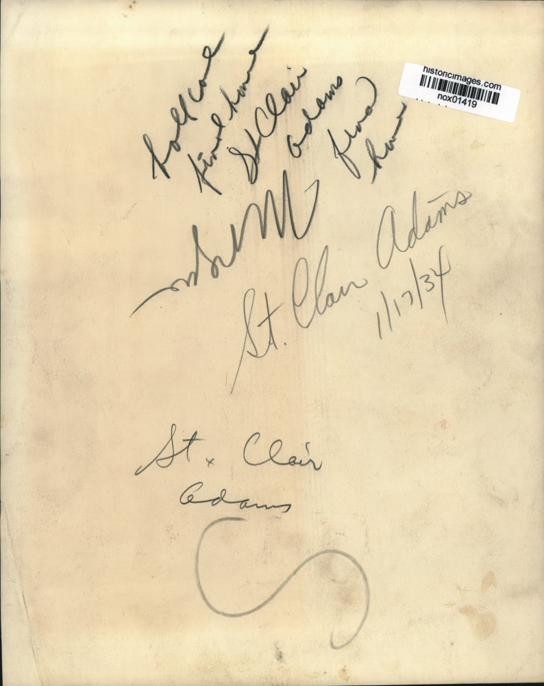 1934 Press Photo St. Clair Adams sits with other men - nox01419