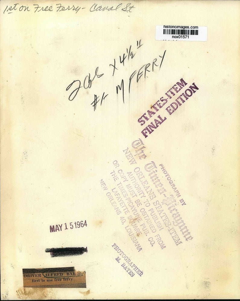 1964 Press Photo New Orleans - First Driver to Use Free Ferry on Canal Street