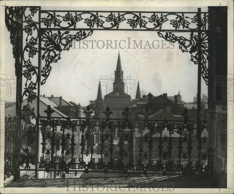 Load image into Gallery viewer, 1946 Press Photo Ancient grillework frames the spires of St. Louis Catherdral
