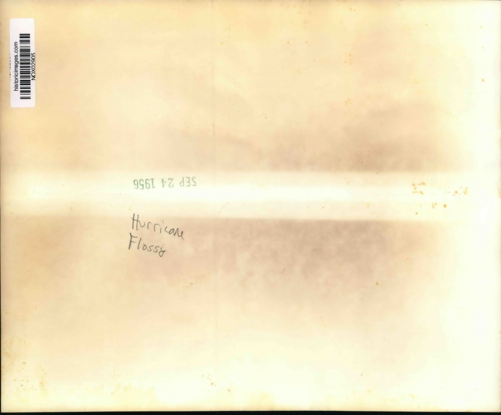 1956 Press Photo Hurricane Flossy - New Orleans Police drive through flood water