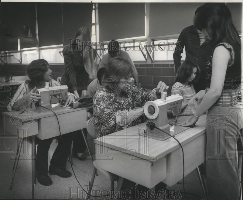 Load image into Gallery viewer, 1974 Press Photo Ray Hackett, David Johnson taught to sew by Riverdale students.
