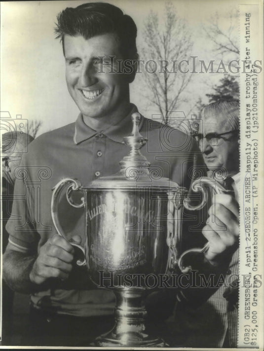 1967 Press Photo George Archer displays trophy at Greater Greenboro Open.- Historic Images