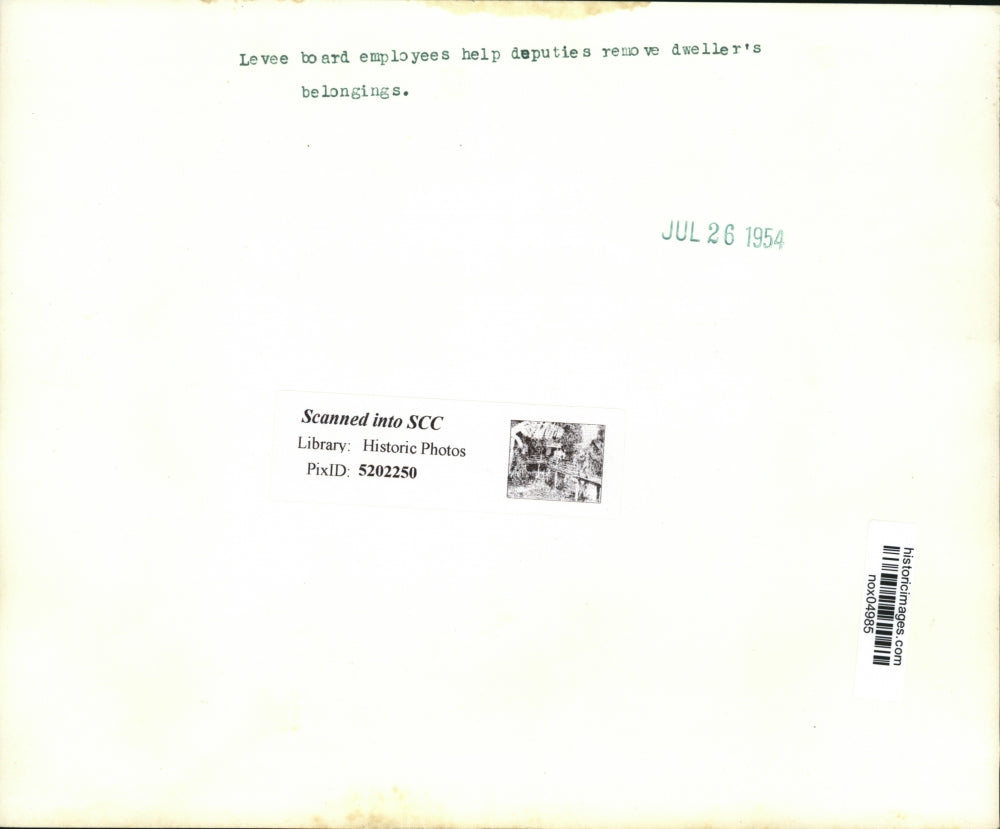 1954 Press Photo Levee Board Employees Help Deputies Remove Dwellers Belongings