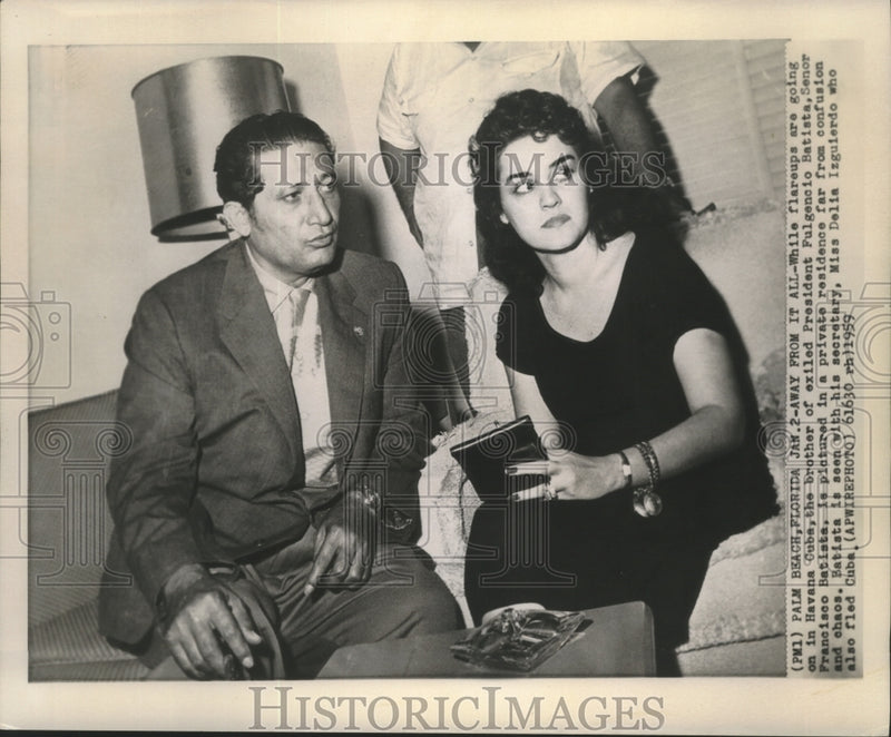 Load image into Gallery viewer, 1959 Press Photo Senor Francisco Batista with his secretary, Delia Izguierdo
