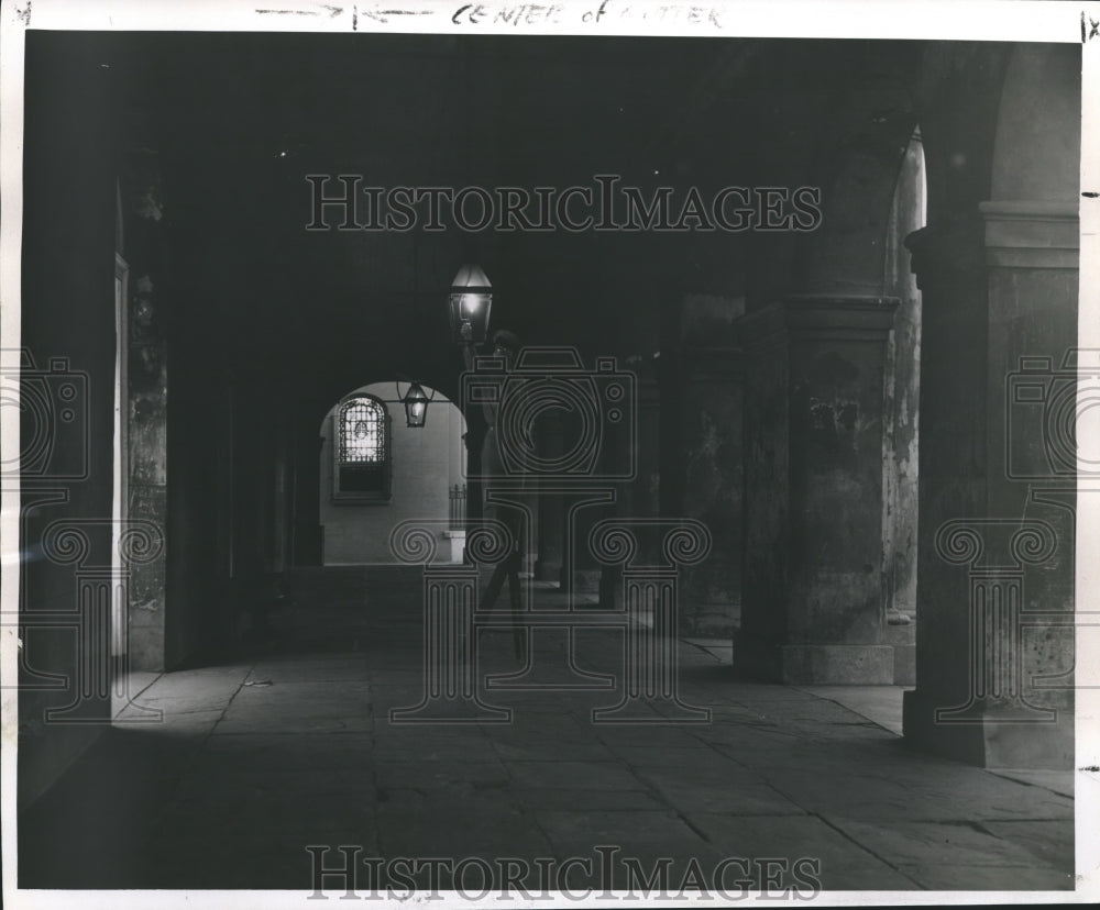 1959 Press Photo New Orleans - Donald C. Henderson Lights Lamp at Cabildo- Historic Images