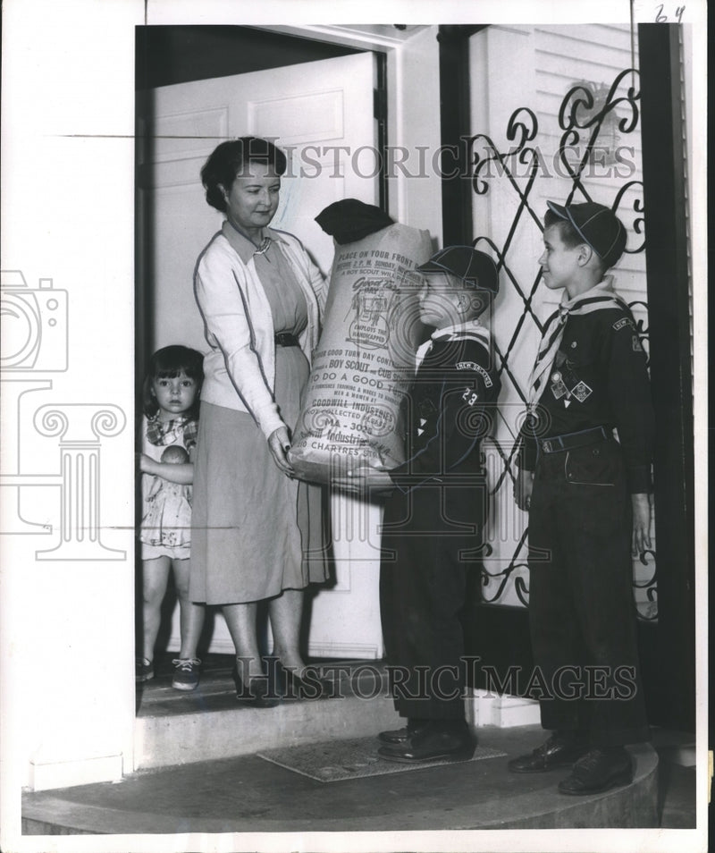 Load image into Gallery viewer, 1955 Press Photo "Good Turn Day" clothing drive staged by New Orleans Cub Scouts
