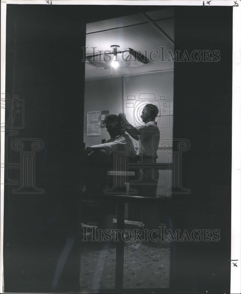 1959 Press Photo Barber J.H. Pugh Works On W.M. Dearman&#39;s Hair - nox08484