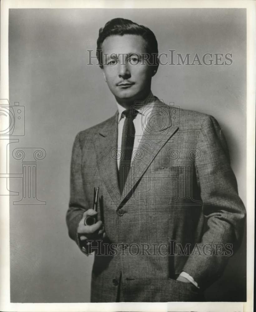 1957 Press Photo Oleg Cassini, Fashion Designer - nox09340- Historic Images