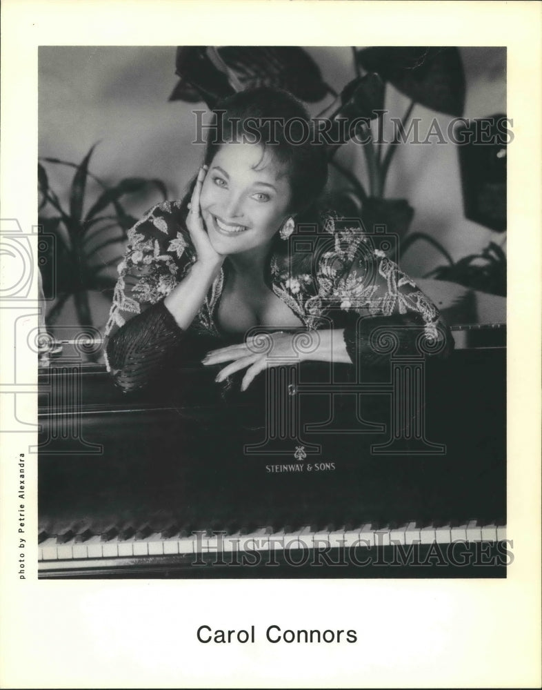 1994 Press Photo Carol Connors Poses With Piano
