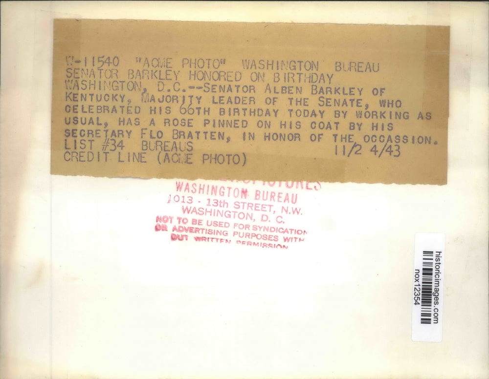 1943 Press Photo Flo Bratten pins rose on Senator Alben Barkley for birthday