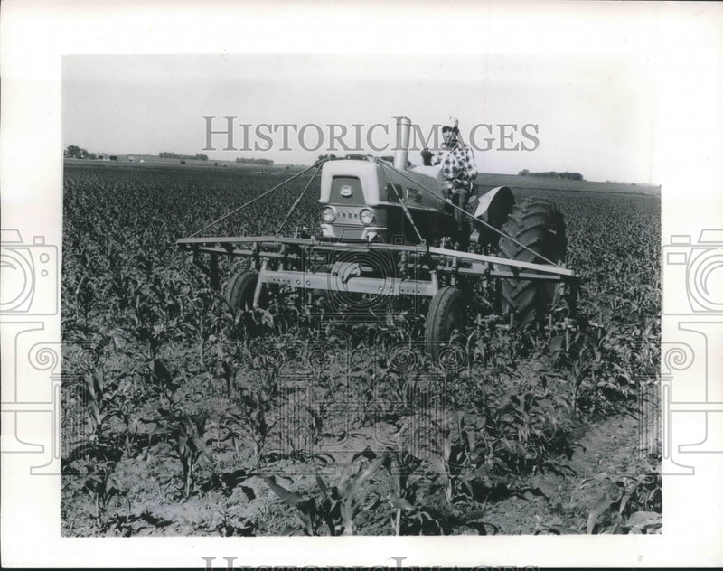 Load image into Gallery viewer, 1963 Press Photo Mechanical Muscle on the farm results in more crops
