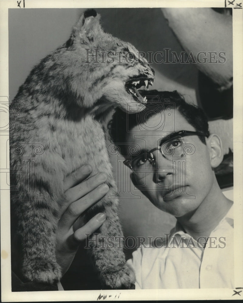 Load image into Gallery viewer, 1956 Press Photo John Dudenhefer of Loyola University with Stuffed Wildcat
