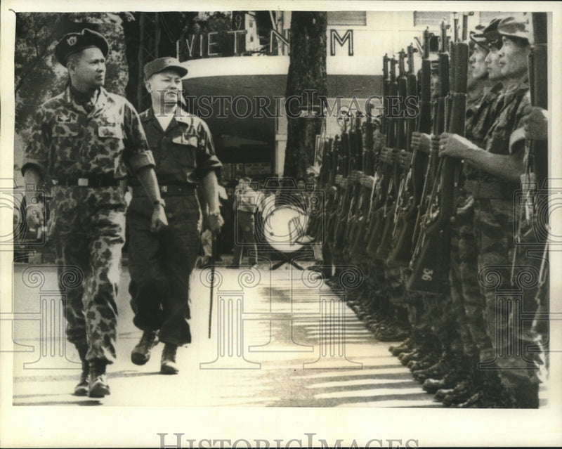 Load image into Gallery viewer, 1963 Press Photo Brig. General Ton That Dinh inspects troops. - nox18179
