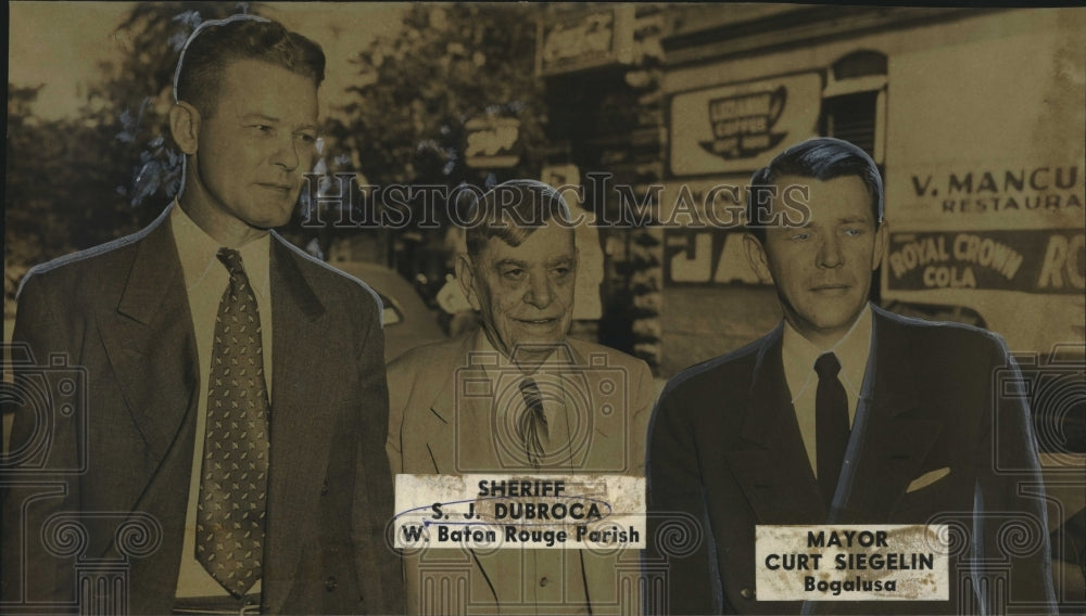 Press Photo (L-R) unidentified, Sheriff S.J. Dubroca and Mayor Curt Siegelin- Historic Images