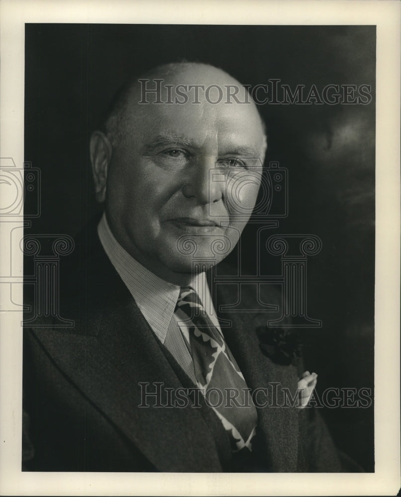 1948 Press Photo Distinguished looking man in a suit and tie - nox18572