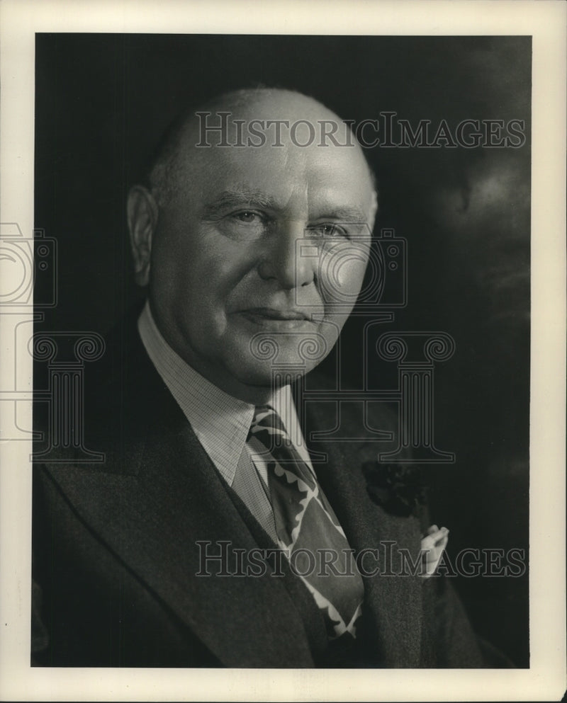 Load image into Gallery viewer, 1948 Press Photo Distinguished looking man in a suit and tie - nox18572
